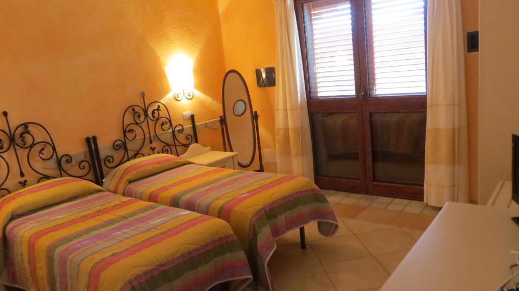 Il Viandante Hotell San Teodoro  Rum bild